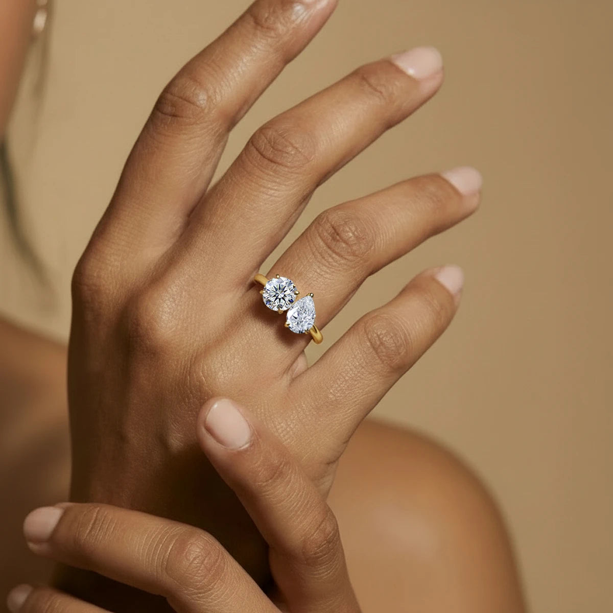 Round And Pear Toi Et Moi Engagement Ring | Earthly Jewels | Model image
