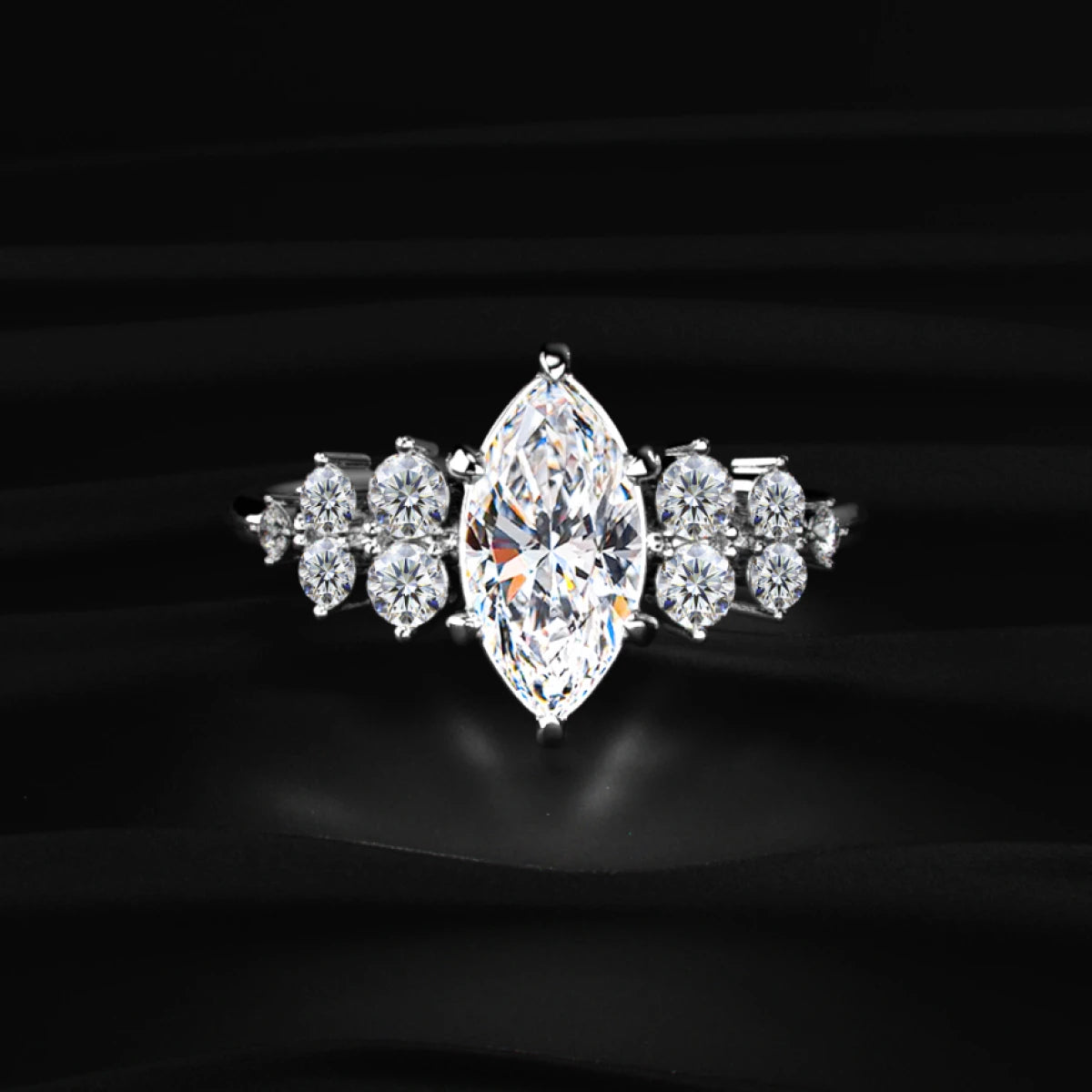 Marquise Solitaire With Cluster Diamond Ring