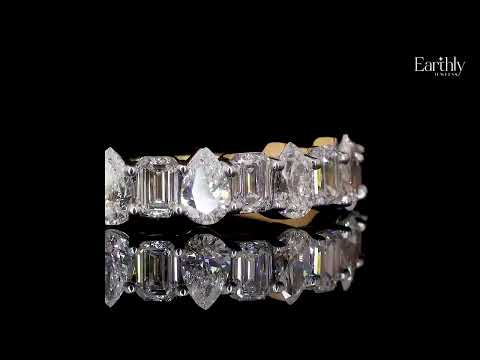 Load video: Pear And Emerald Cut Half Eternity Ring | Earthly Jewels