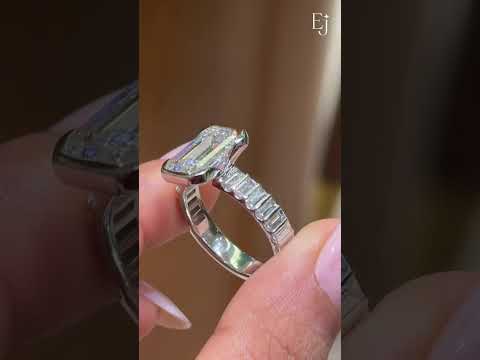 Load video: Emerald Diamond Half Bezel Ring with Side Baguette Stones