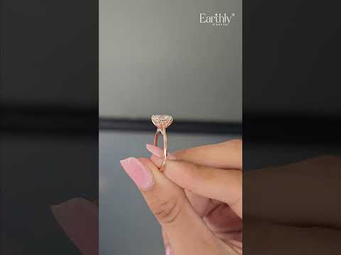 Load video: Oval Solitaire Ring With Cathedral Floral Prong | Earthly Jewels