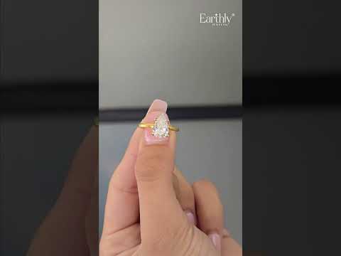 Load video: Pear Solitaire Floral Prong Ring | Earthly Jewels