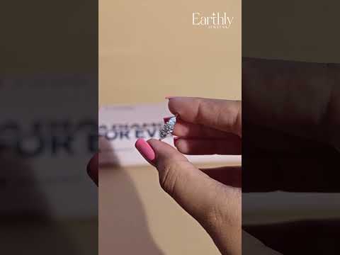 Load video: Round Diamond Ring With Pear Side Stones | Earthly Jewels