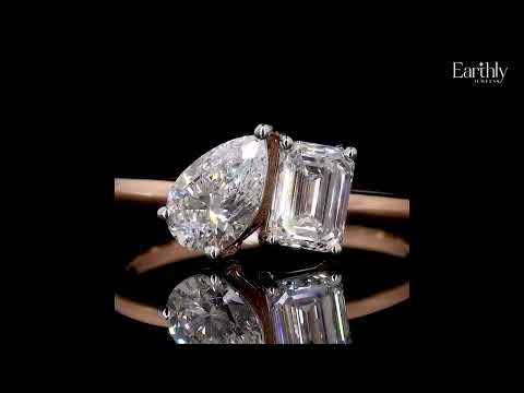 Load video: Emerald And Pear Cut Toi Et Moi Engagement Ring