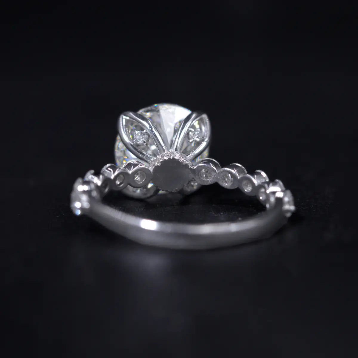 Round Diamond Engagement Ring With Floral Prong | Earthly Jewels