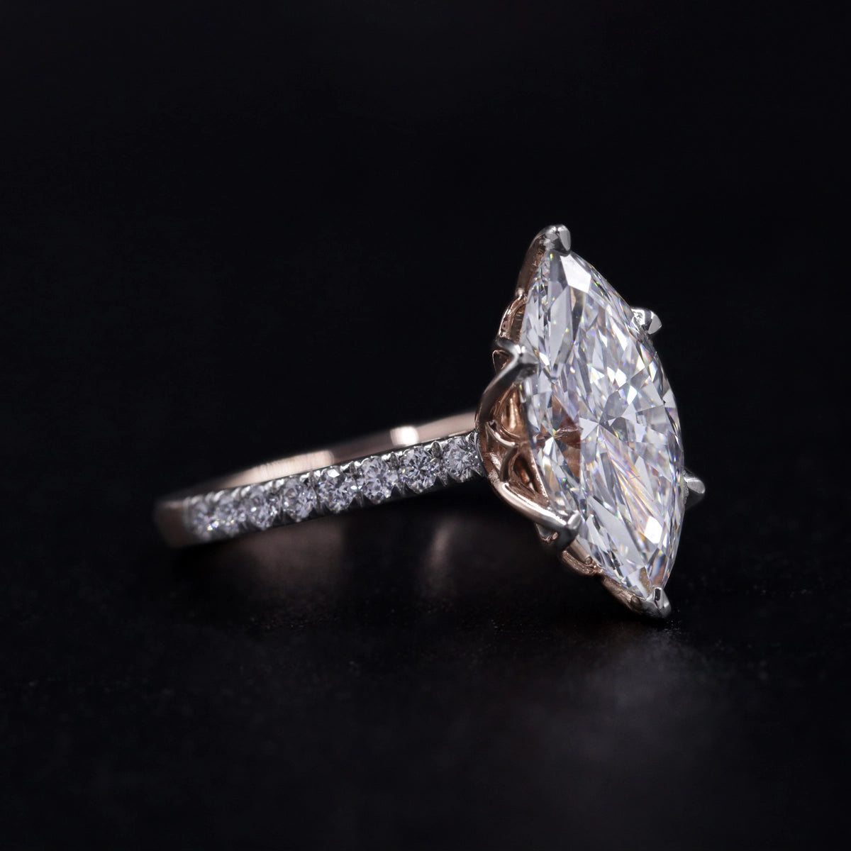 Marquise Solitaire Engagement Ring With Floral Prongs | Earthly Jewels