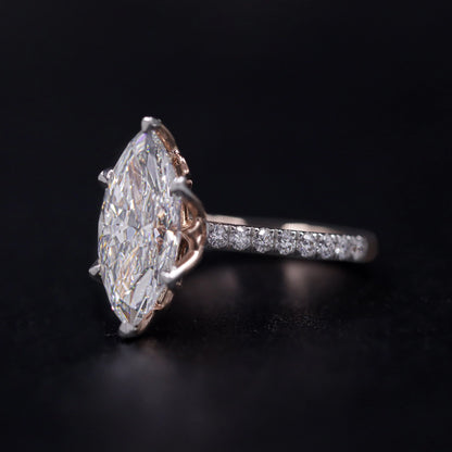 Marquise Solitaire Engagement Ring With Floral Prongs | Earthly Jewels
