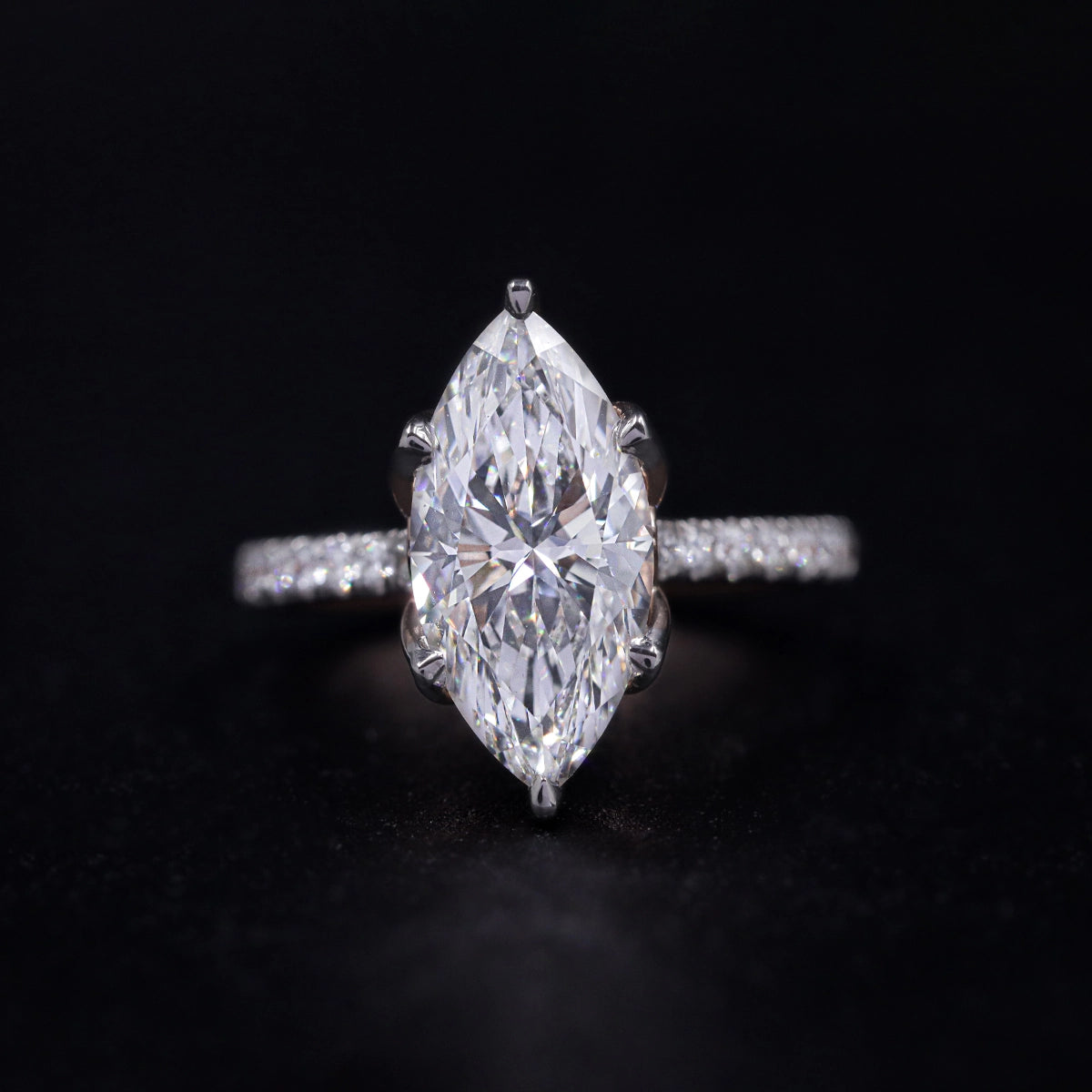 Marquise Solitaire Engagement Ring With Floral Prongs | Earthly Jewels