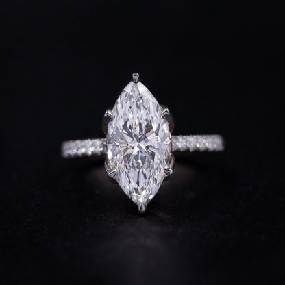 Marquise Solitaire Engagement Ring With Floral Prongs | Earthly Jewels