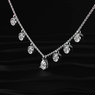 Pear Shape Diamond Drop Necklace with Round Diamond Stations