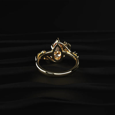 Pear Diamond Ring with Side Accents