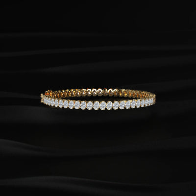 Oval cut natural diamond tennis bracelet in fine gold