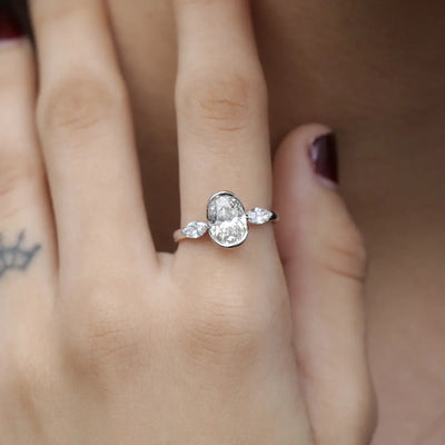 Oval Half Bezel Triple Diamond Engagement Ring | Earthly Jewels