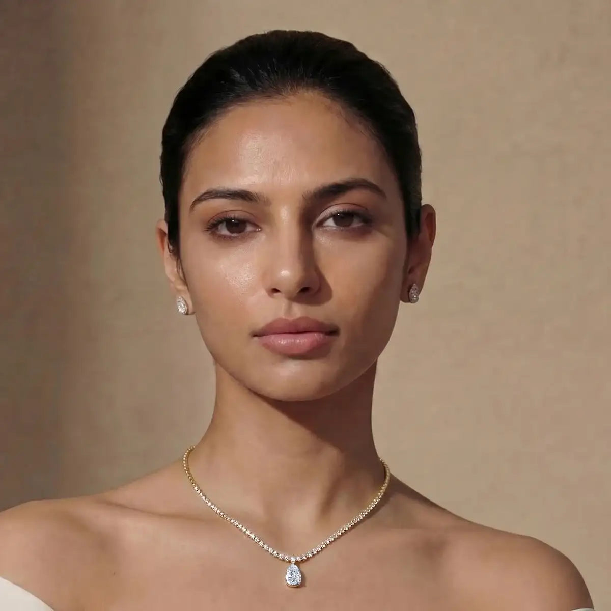 Round Diamond Tennis Necklace with Pear Pendant | Earthy Jewels | Model Image