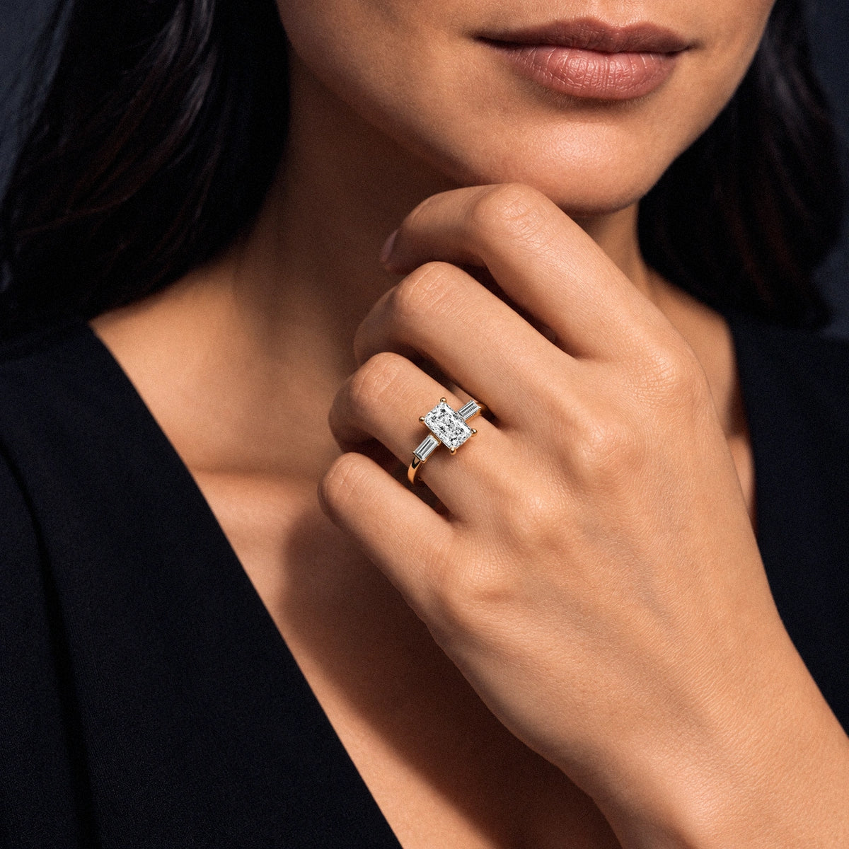 Radiant Solitaire Engagement Ring With Tapered Baguette | Model Image