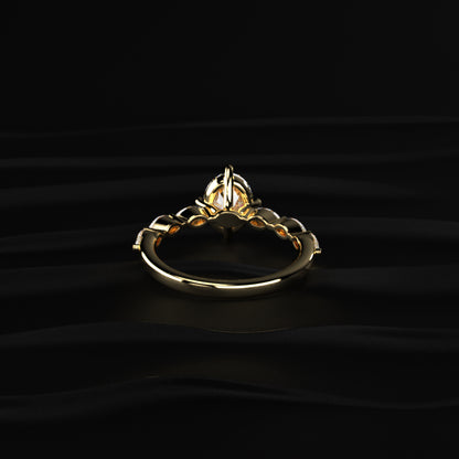 Oval Diamond Ring With Marquise Side Stones