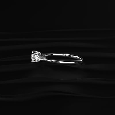 Round Diamond Ring With Pear Side Stones | Earthly jewels