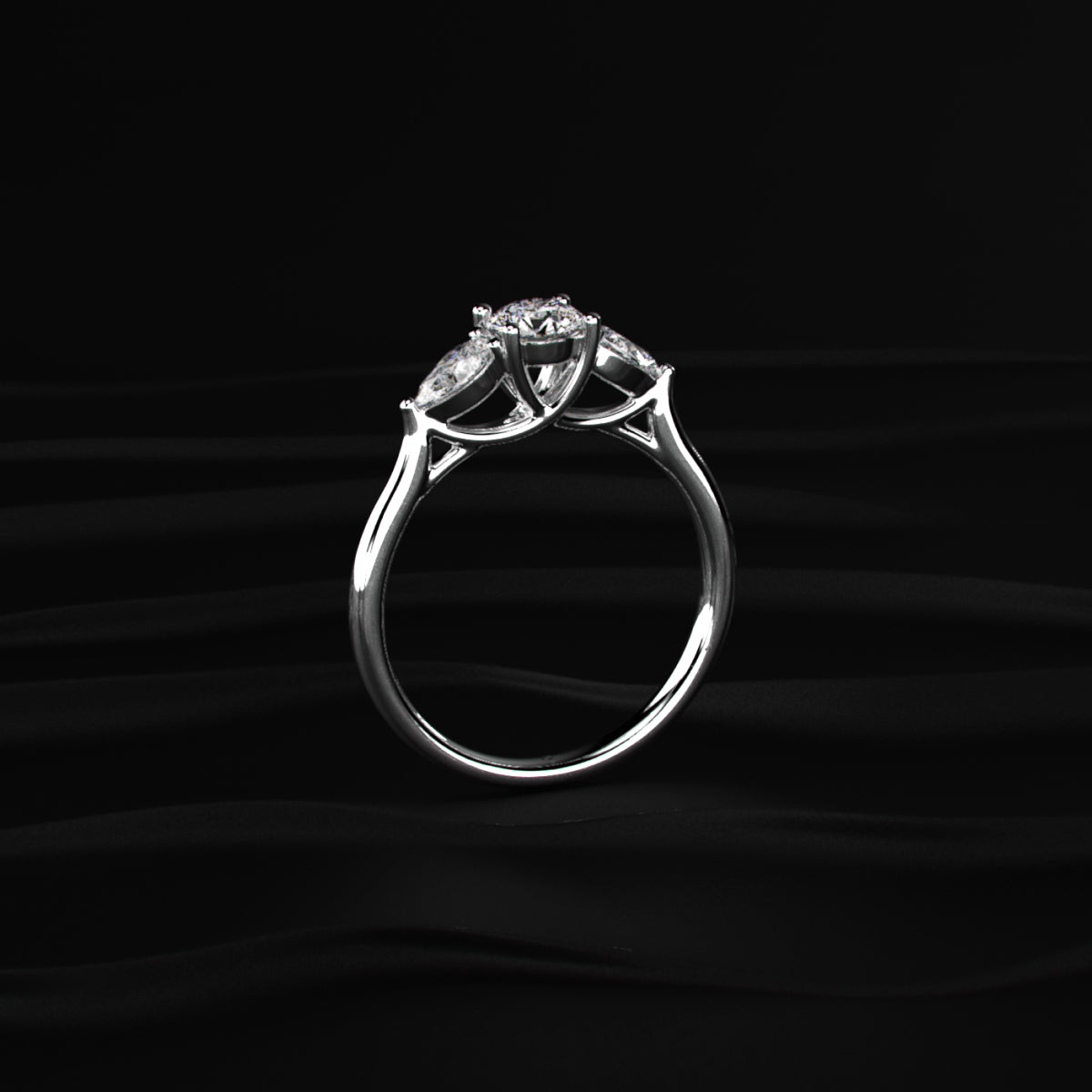 Round Diamond Ring With Pear Side Stones | Earthly jewels