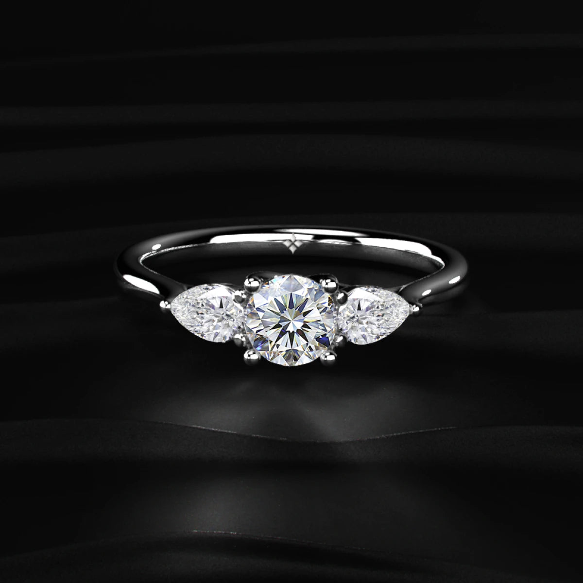 Round Diamond Ring With Pear Side Stones | Earthly jewels
