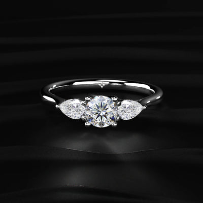 Round Diamond Ring With Pear Side Stones | Earthly jewels