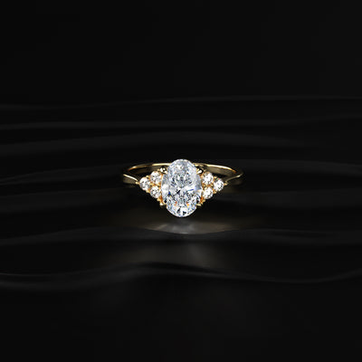 Oval Solitaire Ring With Round Accent Stones | Earthly Jewels