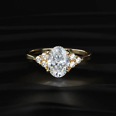Oval Solitaire Ring With Round Accent Stones | Earthly Jewels