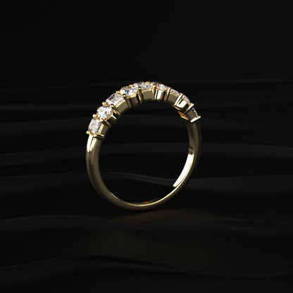 Pear And Emerald Cut Half Eternity Ring | Earthly jewels