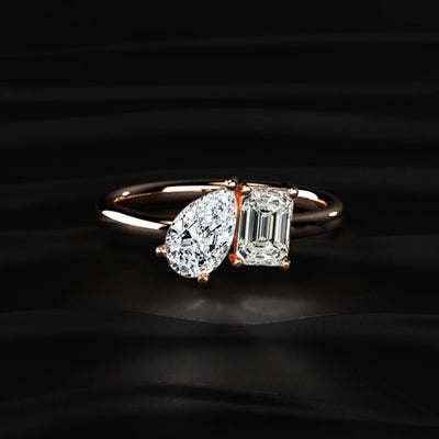 Emerald And Pear Cut Toi Et Moi Engagement Ring | Earthly jewels