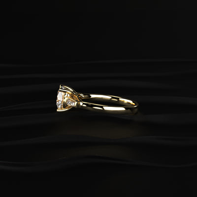Round Solitaire Engagement Ring With Tapered Baguette | Earthly Jewels