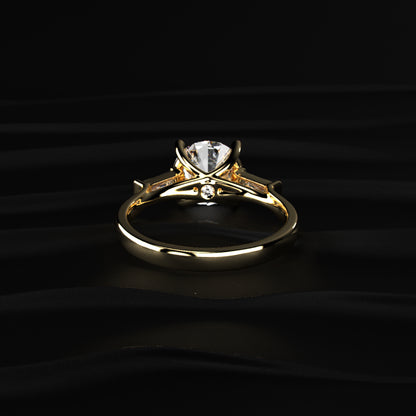 Round Solitaire Engagement Ring With Tapered Baguette