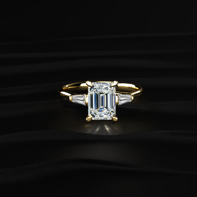 Emerald Solitaire Engagement Ring With Tapered Baguette | Earthly Jewels