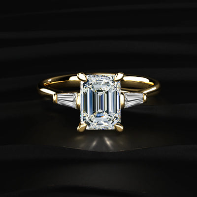 Emerald Solitaire Engagement Ring With Tapered Baguette | Earthly Jewels