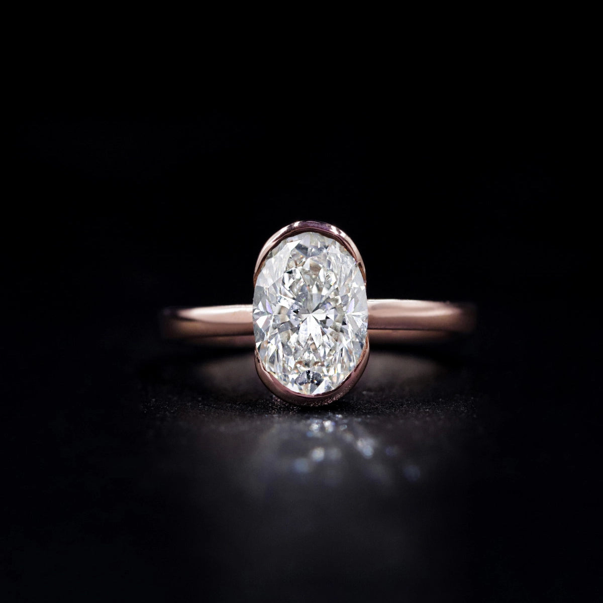 Oval Solitaire Half Bezel Engagement Ring