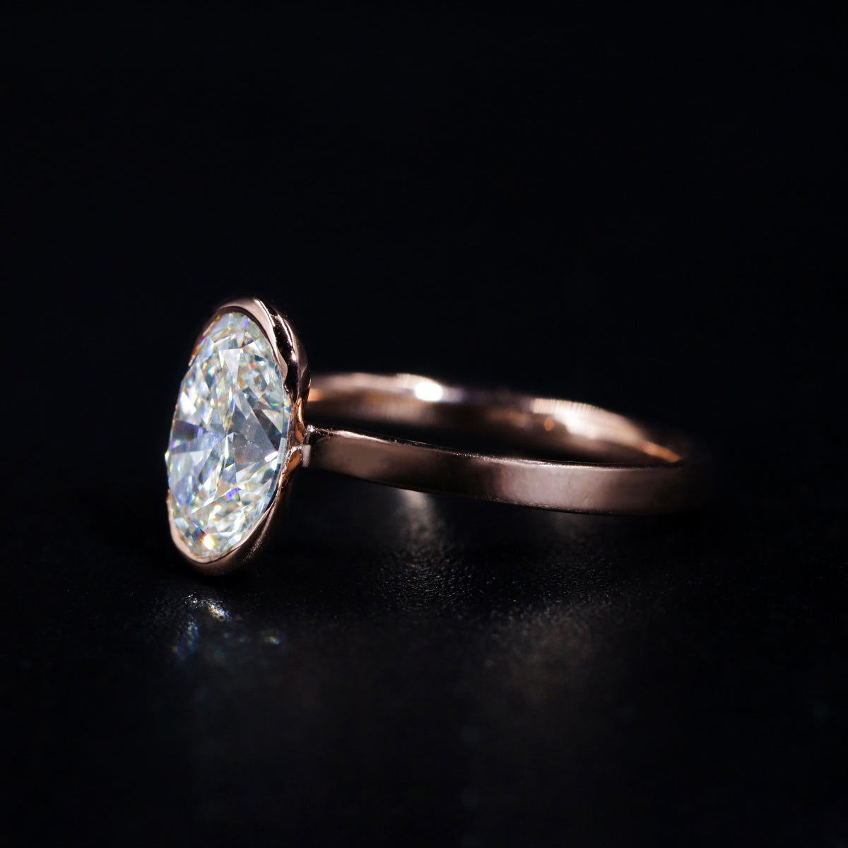 Oval Solitaire Half Bezel Engagement Ring