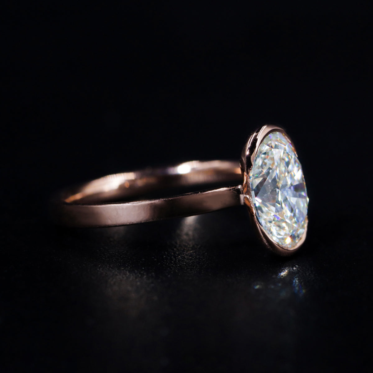 Oval Solitaire Half Bezel Engagement Ring