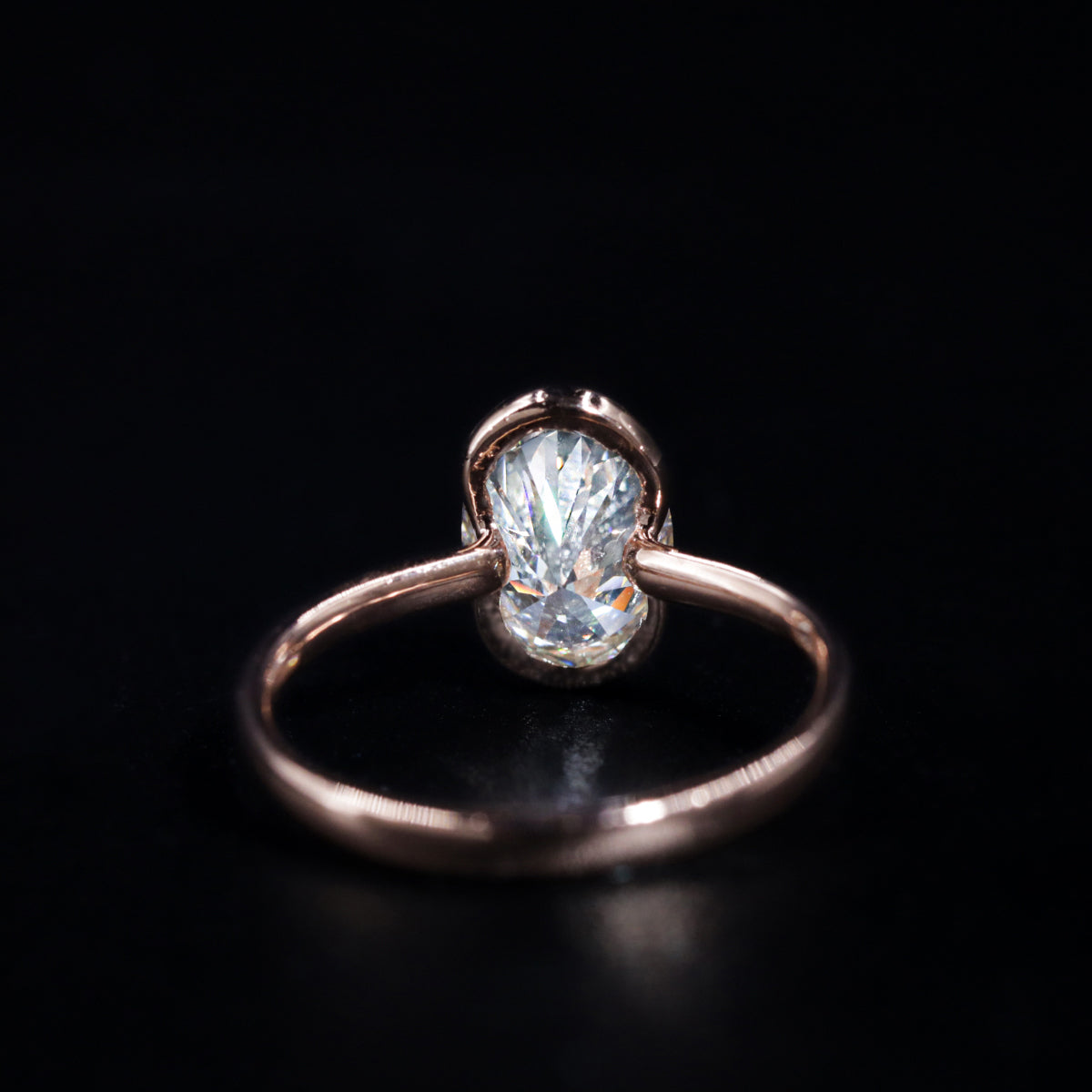 Oval Solitaire Half Bezel Engagement Ring