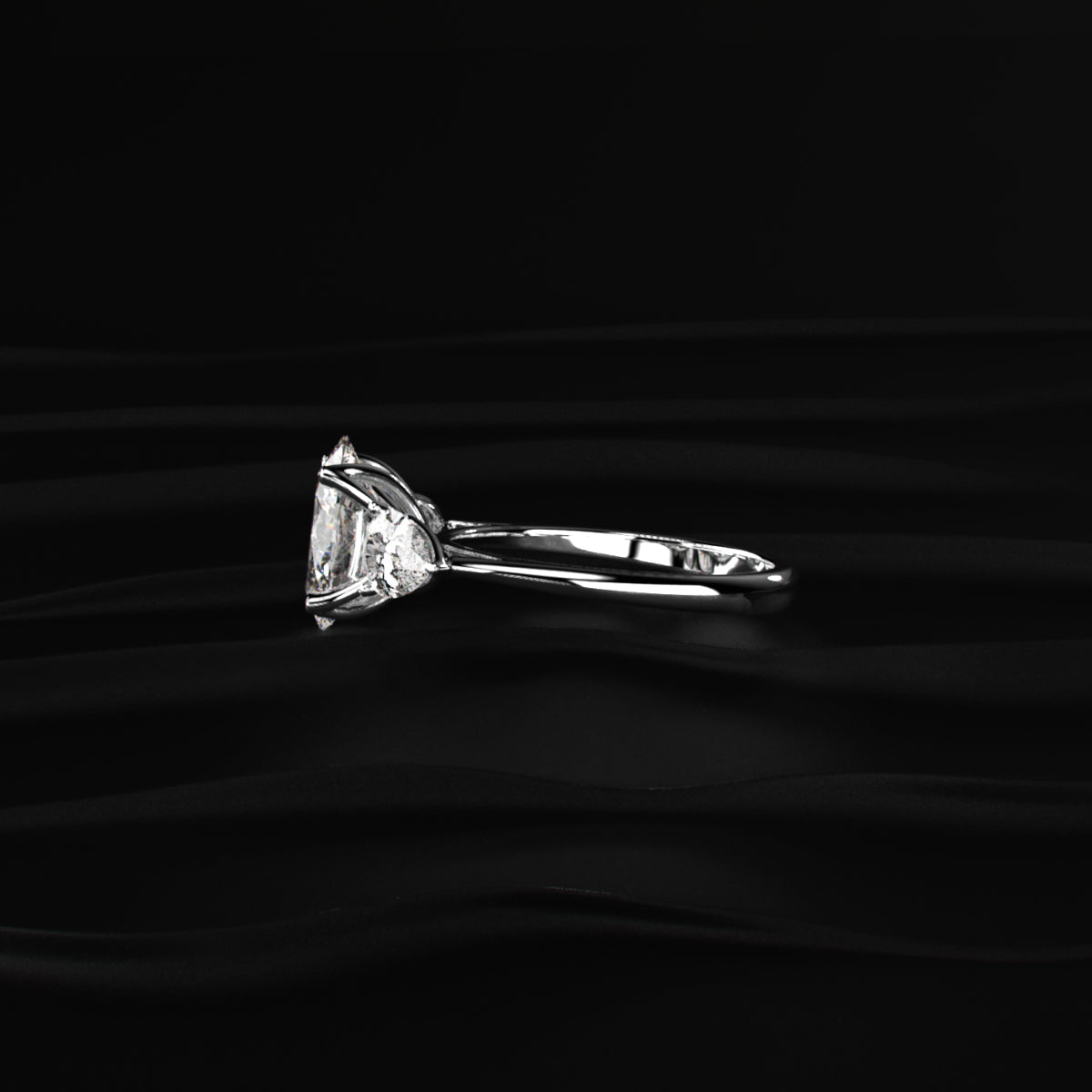 Oval Diamond Triology Ring In Floral Setting With Side Pear