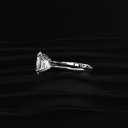 Oval Diamond Triology Ring In Floral Setting With Side Pear