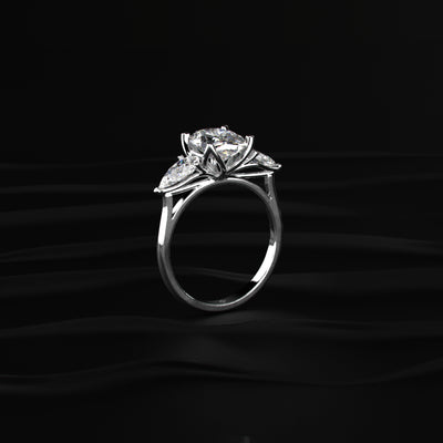 Oval Diamond Triology Ring In Floral Setting With Side Pear | Earthly Jewels