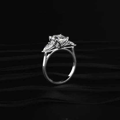 Oval Diamond Triology Ring In Floral Setting With Side Pear