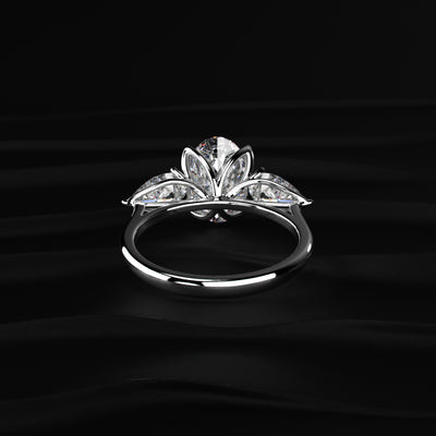 Oval Diamond Triology Ring In Floral Setting With Side Pear | Earthly Jewels
