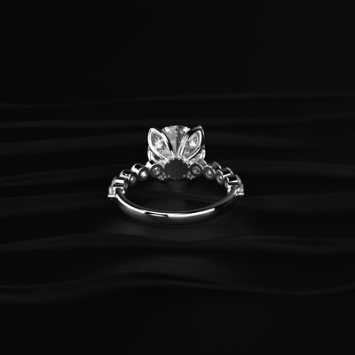 Round Diamond Engagement Ring With Floral Prong | Earthly jewels 