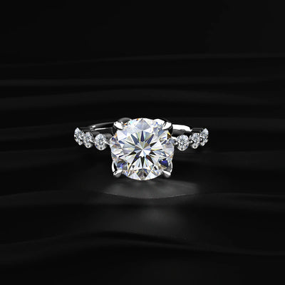 Round Diamond Engagement Ring With Floral Prong | Earthly jewels 