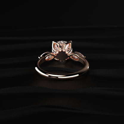 Round Floral Solitaire Ring With Side Marquise Stone