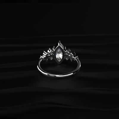 Marquise Solitaire With Cluster Diamond Ring