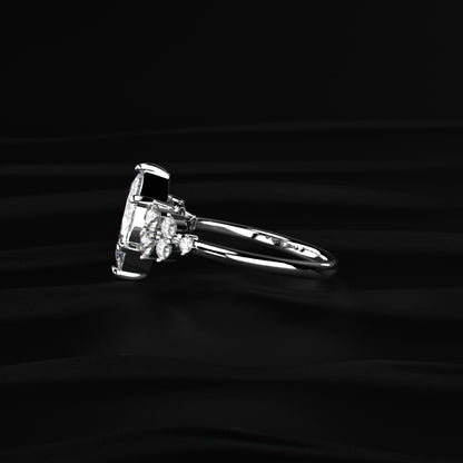 Marquise Solitaire With Cluster Diamond Ring