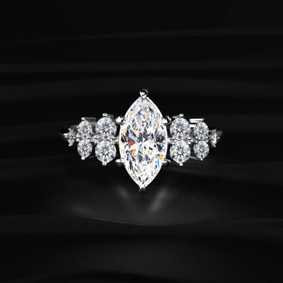 Marquise Solitaire With Cluster Diamond Ring