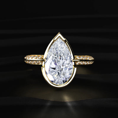 Pear Diamond Half Bezel Pave Ring