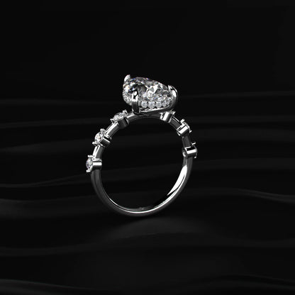 Pear Shaped Diamond Ring With Spaced Stone | Earthly Jewels   