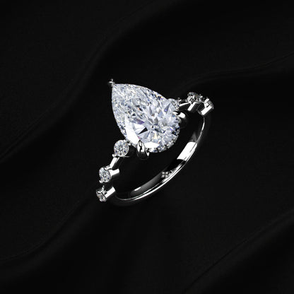 Pear Shaped Diamond Ring With Spaced Stone | Earthly Jewels   